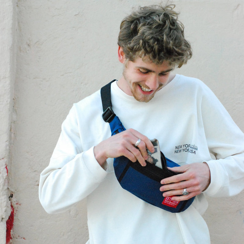Model wear Manhattan Portage Navy Alleycat Waist Bag