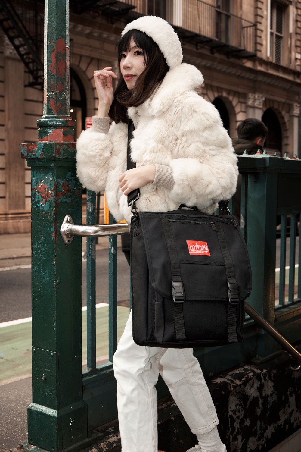 Female model wear Manhattan Portage Commuter Laptop Bag (17") W/ Back Zipper Ver. 2 on shoulder