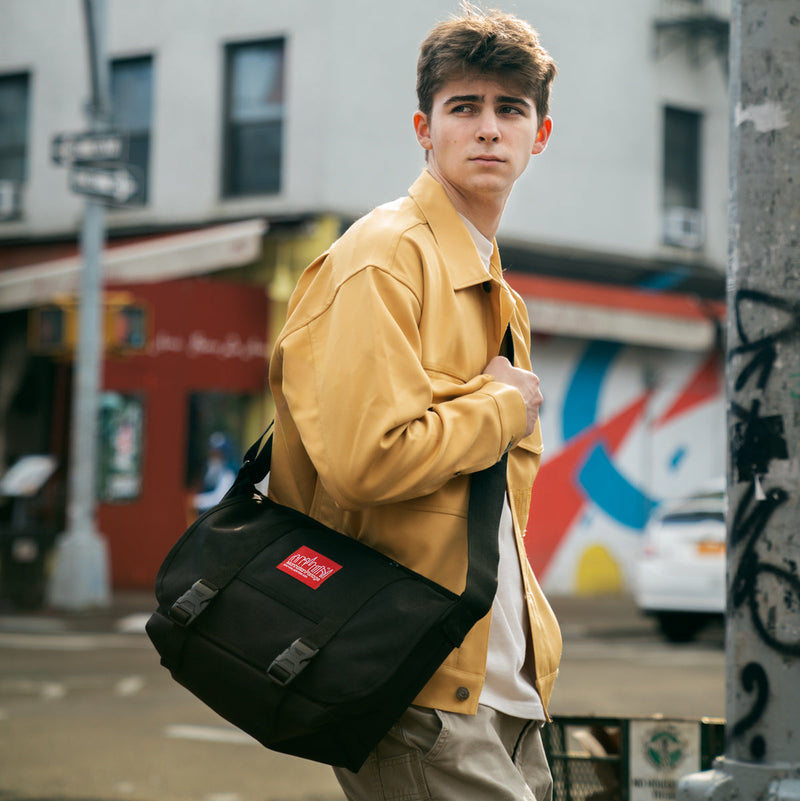 Model wears Manhattan Portage NY Messenger Bag JR (MD) black