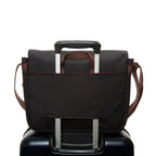 Token Waxed Nylon Whitehall Laptop Bag Black attach on luggage